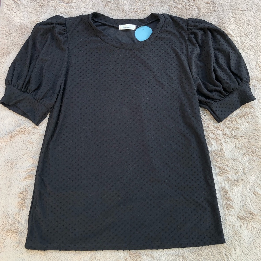 New with tags! Black short sleeve top with black dots.